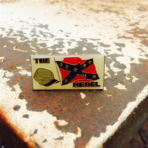 the rebel pin rebel flag and confederate hat vintage lapel pin