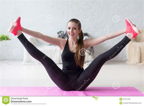 funny smiling girl holding legs apart doing stock image image of funny physical 54197139