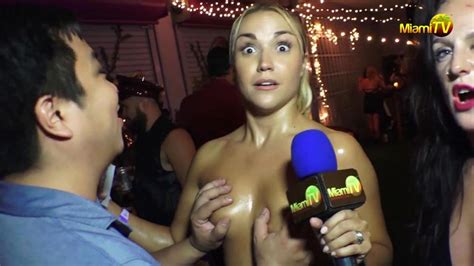 outrageous tv presenter jenny scordamaglia lets party guests grope her breasts and bum in her