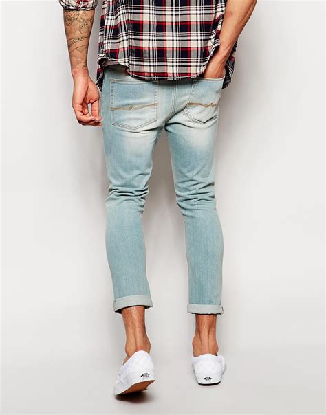 asos super skinny jeans ankle grazer in light wash in blue for men lyst