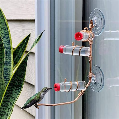 bird feeder geometric window hummingbird feeder  feeding ports