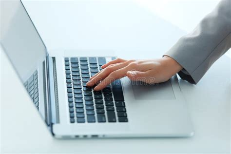 closeup portrait  woman  hand typing  computer keyboard stock