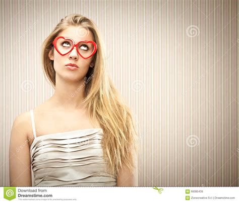 beautiful blonde girl with heart glasses dream her love stock image