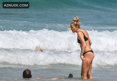 miley cyrus wears a black bikini at the beach in byron bay australia 09 01 2018 aznude