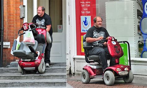 benefits dad gwynfor jones caught lifting 17 stone mobility scooter up