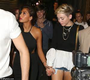 miley cyrus is taken for a night on the town by honorary londoner nicole scherzinger daily
