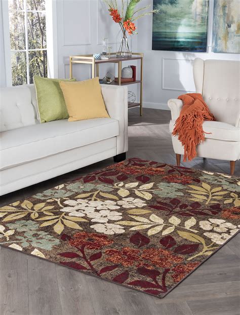 transitional  area rug    floral brown red living