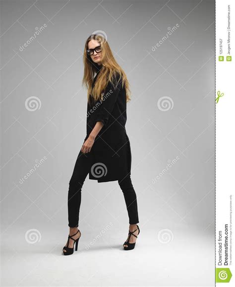 Attractive Long Legs Long Hair Model Woman Wearing Geeky Glasses Stock