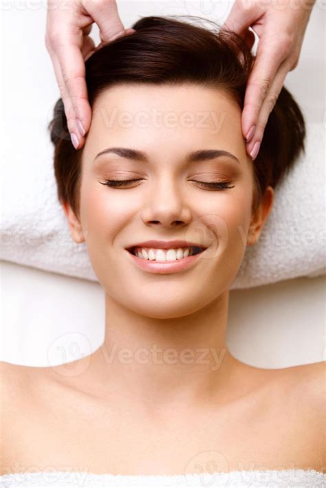 Face Massage Close Up Of A Young Woman Getting Spa Treatment 907866