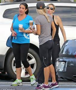 elin nordegren shows off her pert figure as she grabs a coffee with pals following morning gym