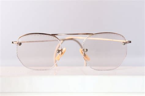 1930s rimless gold filled eyeglasses with deco patterning by w or