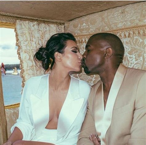 kim kardashian shows off her cleavage in a loved up photo