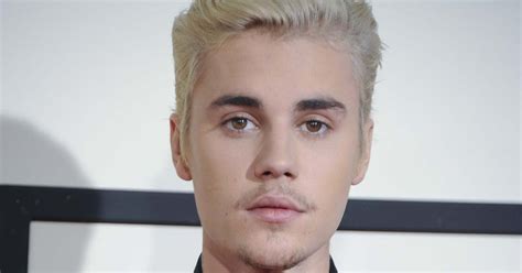 Justin Bieber Gets Dreadlocks As He Styles His Blonde Hair And Poses