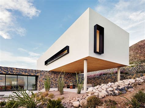 house overlooks  desert landscape   hillside  texas