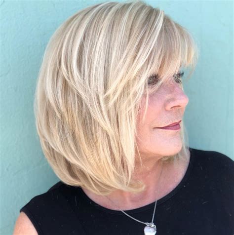 medium hairstyles for women over 50 with bangs 85 stylish short