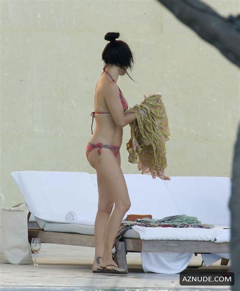 adriana lima shows off her bikini body at the pool in miami aznude