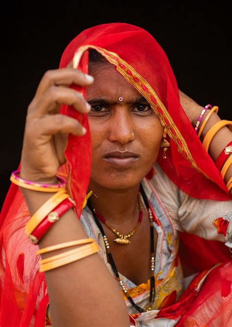 Portrait Of A Rajasthani Woman In Traditional Red Sari Rajasthan