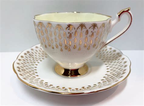 antique queen anne tea cup  saucer english bone china cups yellow