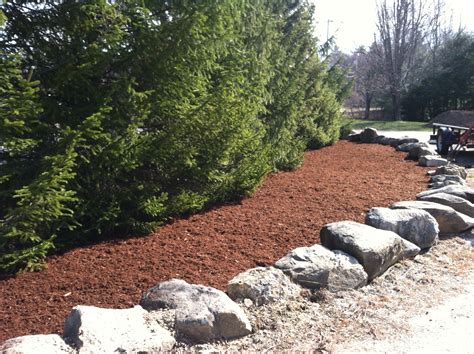bark mulch   beautiful yard  nh spring landscaping services