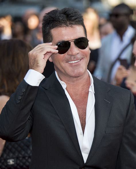 public outing simon cowell   mother   child