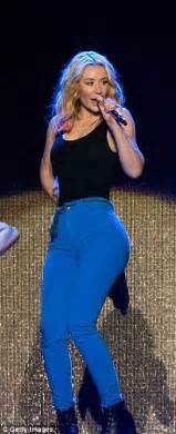 iggy azalea shows off her curves in tight blue trousers at