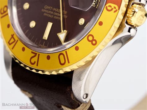 rolex vintage gmt master tigereye ref 1675 18k yellow gold stainless
