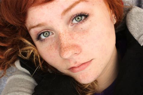 redhead with beautiful green eyes red hair freckles freckles girl