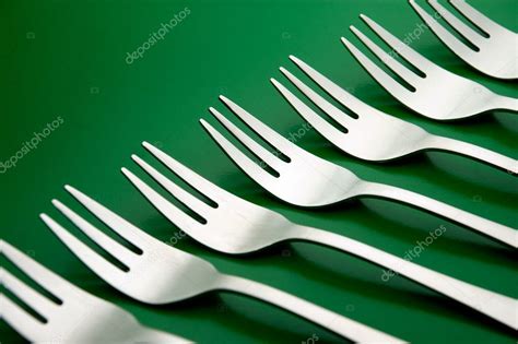 arrangement  silverware forks stock photo  luisfico