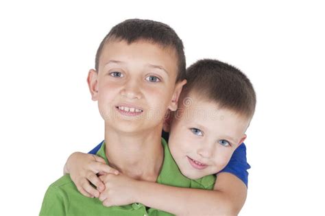 younger brother hugs  elder brother stock photo image  family