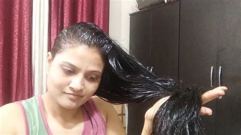 Heavy Hair Oiling From Coconut Oil Combing And Braiding Of Long Hair
