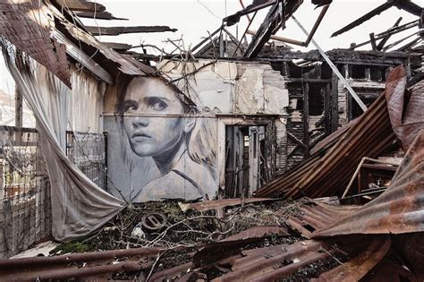 Street Art Portraits On Abandoned Buildings Reveal The
