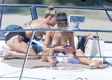 olivia culpo topless on a boat of the day