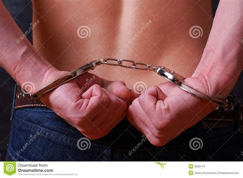 man handcuffed hands at the back stock images image 5093174