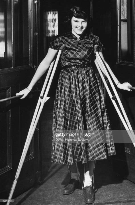 Polio January 1952 A Girl With Leg Braces Smiles While St… Flickr