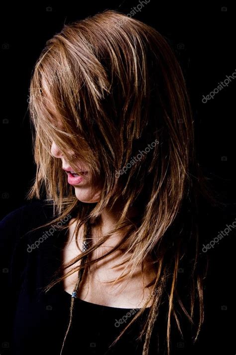 young woman hiding  face  hair stock photo  imagerymajestic