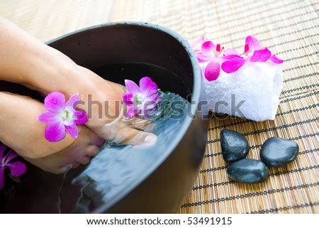 feminine feet  foot spa bowl  orchids stock image everypixel