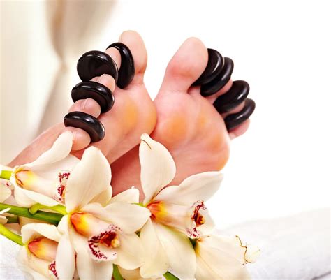 top 8 incredible benefits of hot stone foot massage
