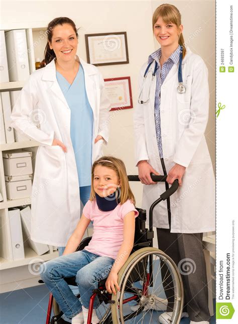girl on wheelchair get doctor assistance stock image image of female girl 24693397