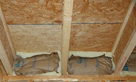install batt insulation floor joist tutorial pics
