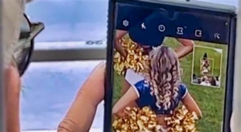 old man caught snapping pics of cheerleader s behind video