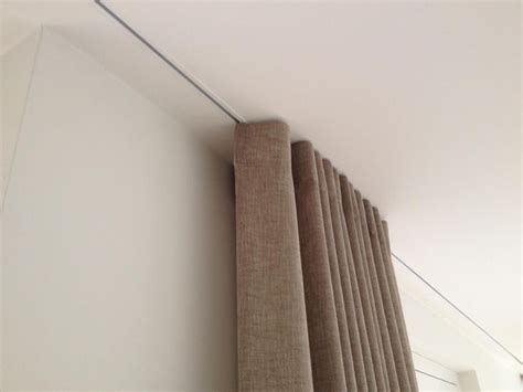gordijnrails verwerkt  gestuukt plafond fabric tiles wave curtains curtains  blinds
