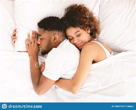 Image Of Hug In Bed Couple Sleeping Hugging Bed Stock