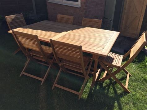 roscana teak wooden outdoor  seater extending dining set