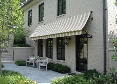 guest house house awnings brick house front door colors patio awning