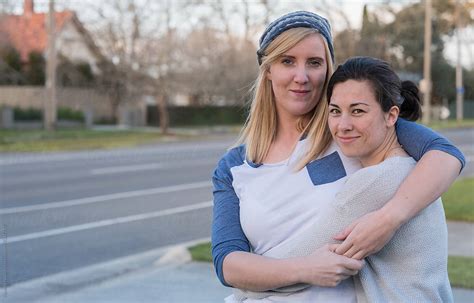 Young Lesbian Couple Embracing By Stocksy Contributor Rowena Naylor