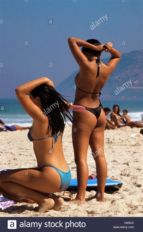Rio De Janeiro Brazil Two Women In Bikinis On Ipanema
