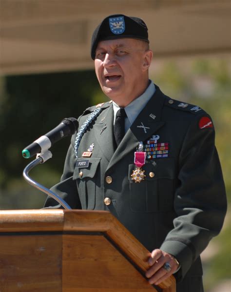army colonel ends  decades  service earns legion  merit