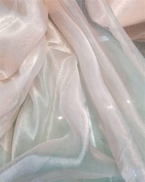 metallic tissue organza pinkish ivory color  silk organza  wide fabric sold   yard