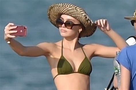 Lily Rose Depp Takes Lots Of Selfies At The Beach