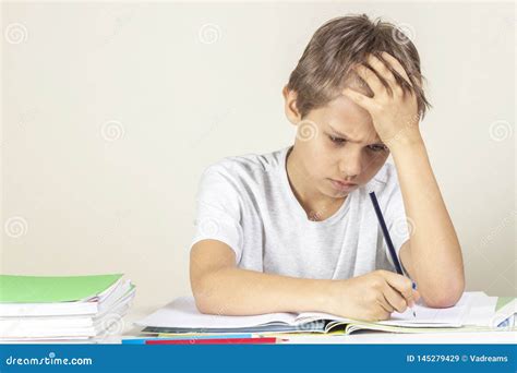 sad boy  homework education school learning difficulties